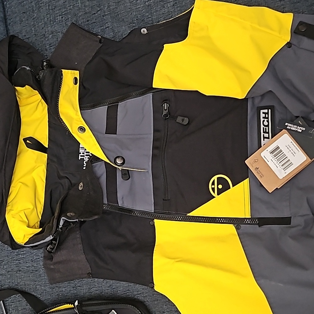 North face speed tech vest with check pack bag.